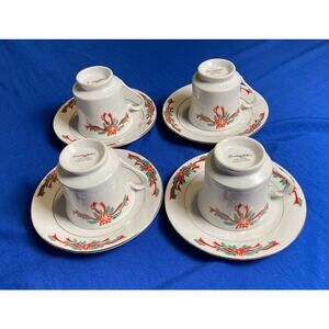 Poinsettia and Ribbons 8 Piece Tea/ Coffe Cup and Plate Set with Storage Case